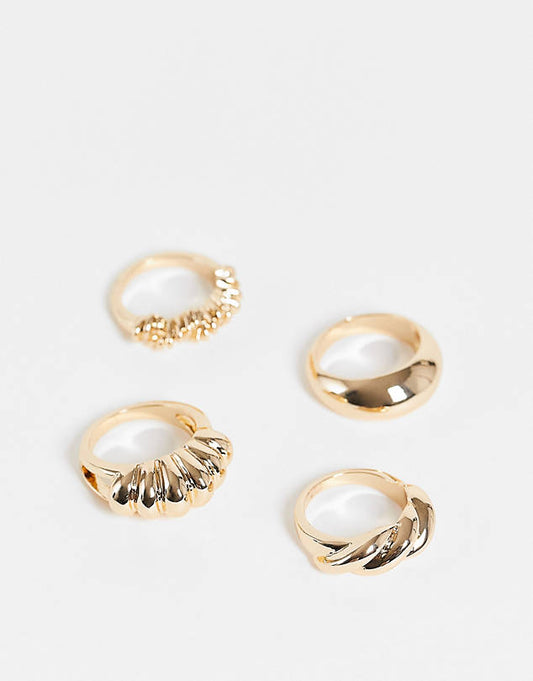 Pack of 4 rings in twist design in gold tone